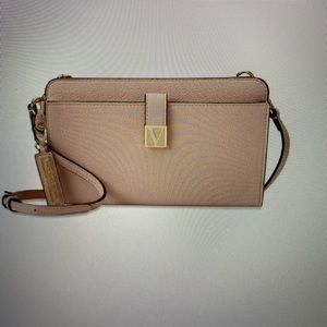 Convertible Crossbody bag or large wrist purse.